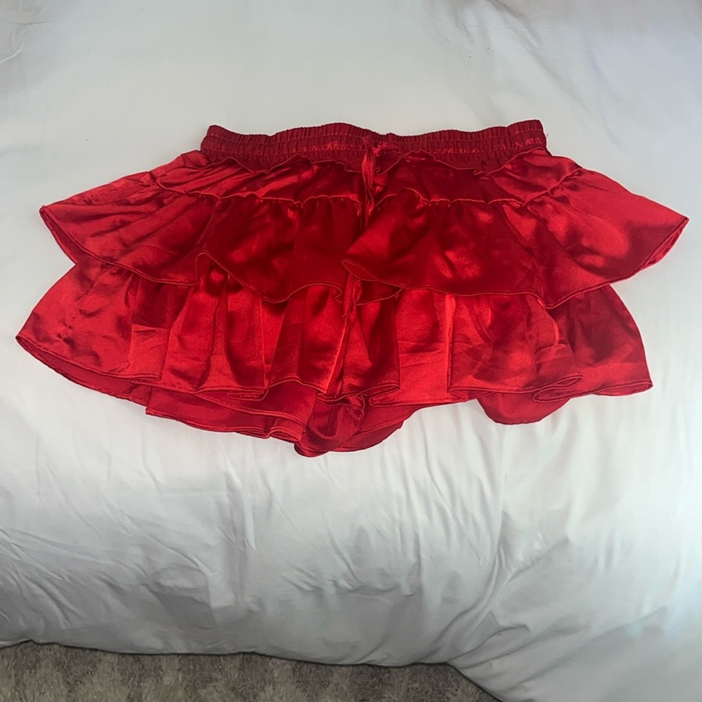Red mini skort with ruffled layers